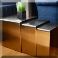 F02. Set of 3 metal nesting tables. 